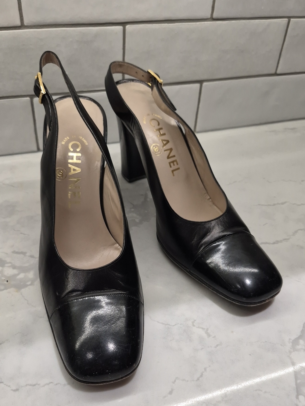 CHANEL Black Leather Square-Toe Slingback Heels with Gold Buckle